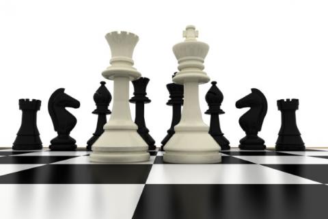 Chess pieces and chess board in black and white